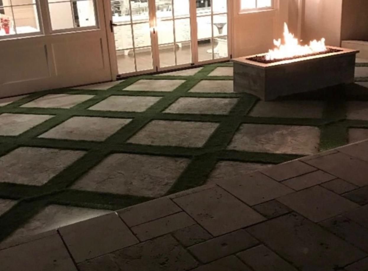 Concrete pavers with turf grid